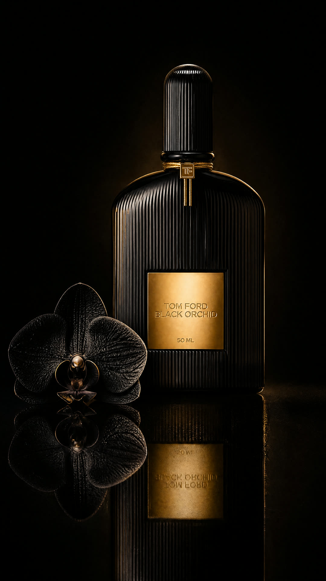 Tom Ford Black Orchid bottle and flower in black and gold light