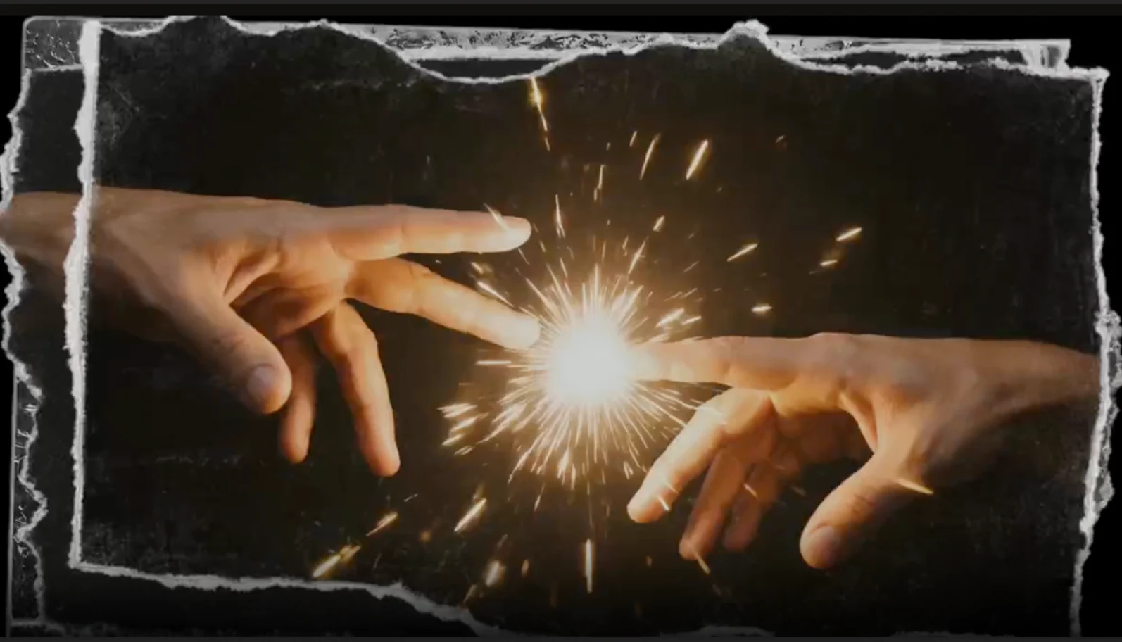 Two hands meeting at a bright spark in Bound